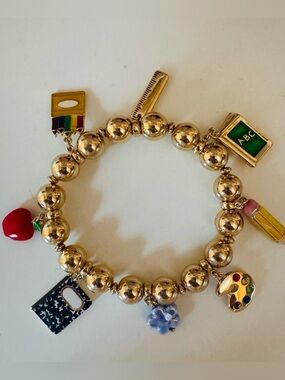Betsey Johnson school teacher charm bracelet. Gold plated school teacher charm.